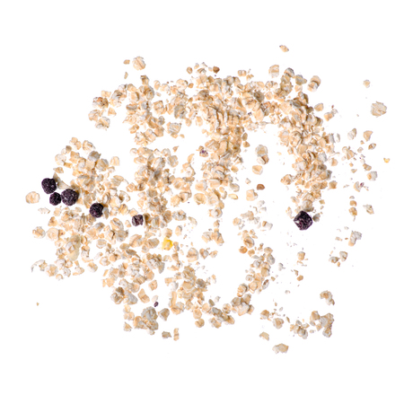 Dry oatmeal with blueberries isolated on white background, top viewの写真素材