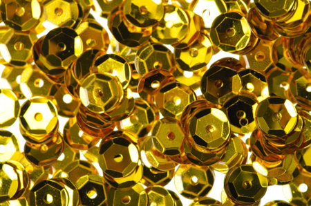 Gold sequins shiny bright decoration macro background
