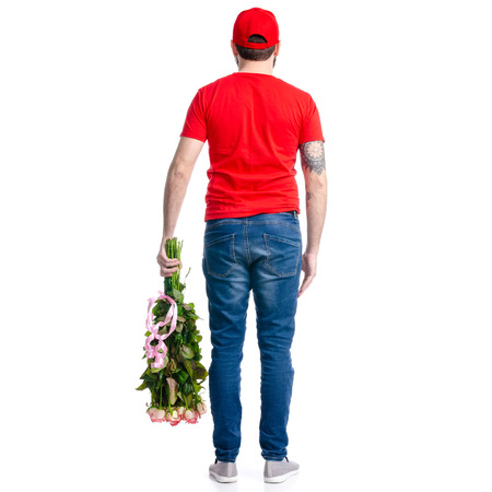 The man flower roses delivery isolated on white background, back viewの写真素材