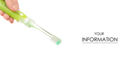 Travel green toothbrush in hand pattern isolated on a white background