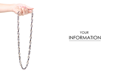 Jewelery bijouterie chain in hand pattern on white background isolationの写真素材