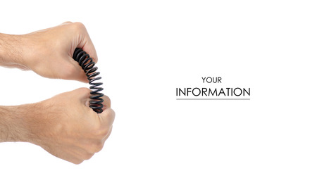 Metal spring in a hand pattern on a white background isolationの写真素材