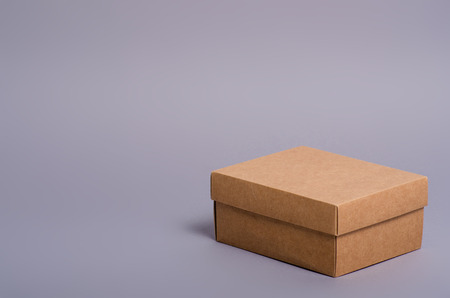 Box brown package minimalism on gray backgroundの写真素材