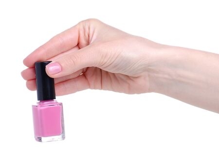 Pink nail polish in handの写真素材