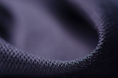 Black material textile cloth texture blur backgroundの写真素材