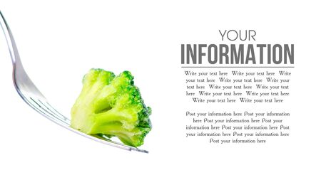 Frozen broccoli on fork on white background isolation, space for textの写真素材