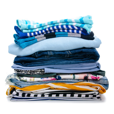 Stack clothing colorful summer on white background isolation, trip conceptの写真素材