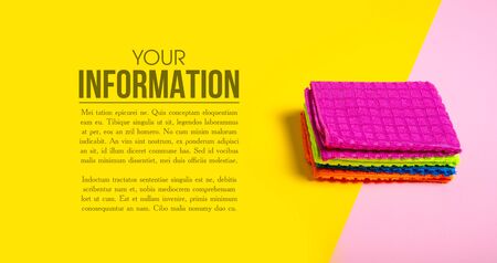 Cleaning rag on yellow pink background, copy spaceの写真素材