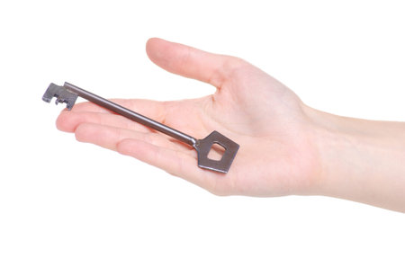 Old key in hand