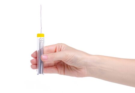 Soldering-iron electronic equipment hold in handsの写真素材