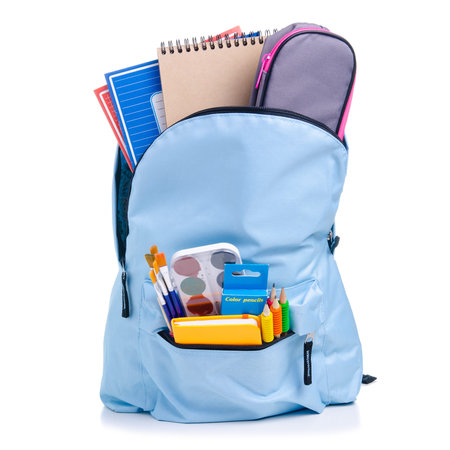 Blue backpack with school supplies on white background isolation