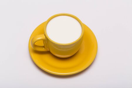cup of milk on a white backgroundの写真素材