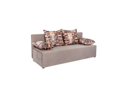 Beige brown soft sofa with large pillows, folding functionの写真素材