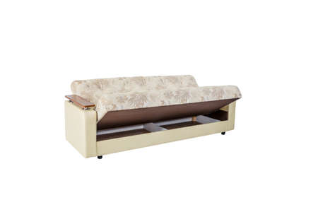 Beige soft sofa with wooden armrests, folding functionの写真素材