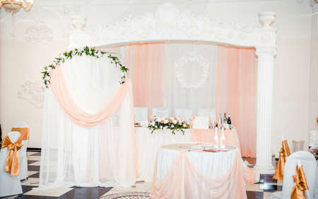 Wedding decoration, elegant arch, documents, champagne, tablesの写真素材