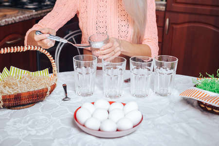 Happy Easter. The process of preparing a solution for coloring Easter eggs.の写真素材