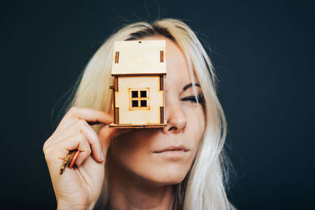 Real estate concept. Buying and selling homes. Debt and loan. Purchase. Home sold. Realtor and Real Estate Agent Services. Rent apartment. Sale of property. Mortgage and payment of taxes.の写真素材