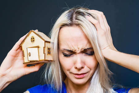 Real estate concept. Buying and selling homes. Debt and loan. Purchase. Home sold. Realtor and Real Estate Agent Services. Rent apartment. Sale of property. Mortgage and payment of taxes.の写真素材