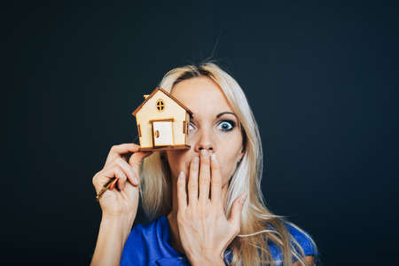 Real estate concept. Buying and selling homes. Debt and loan. Purchase. Home sold. Realtor and Real Estate Agent Services. Rent apartment. Sale of property. Mortgage and payment of taxes.の写真素材