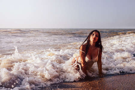 girl spends her vacation on the beach.の写真素材