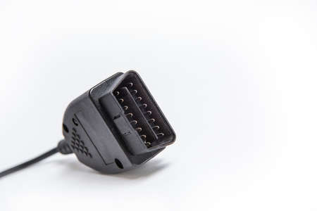 Car connector for checking and diagnosing the electrical system, close-up white background.の写真素材