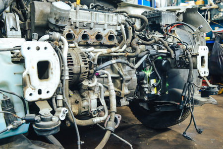 Close-up, internal combustion engine repair. The restoration of the demolished car after the accident.の写真素材
