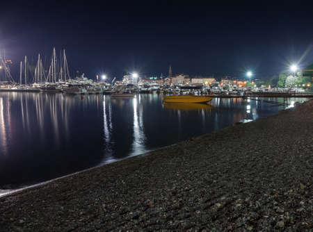 Parking of yachts and boats at nightの写真素材