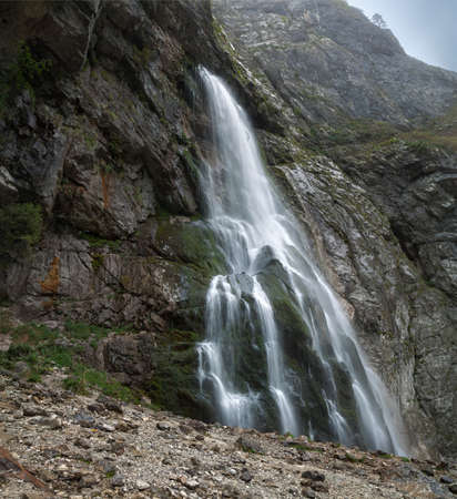 water flows from the rockの写真素材