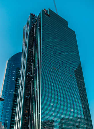 Evening Nurzhol boulevard, view on Temir Zholy Tower and Emerald Quarter, Nur-Sultan, Astana; Kazakhstanのeditorial素材