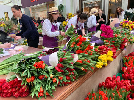 Flower sellers pack flowers for the March 8 holiday.のeditorial素材