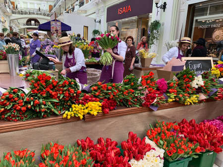 Flower sellers pack flowers for the March 8 holiday.のeditorial素材