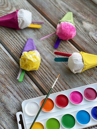 Step by step learning how to make a childrens craft ice cream from the carton of eggs.の写真素材