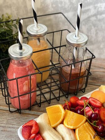 Summer fruits and berries, making smoothies.の写真素材