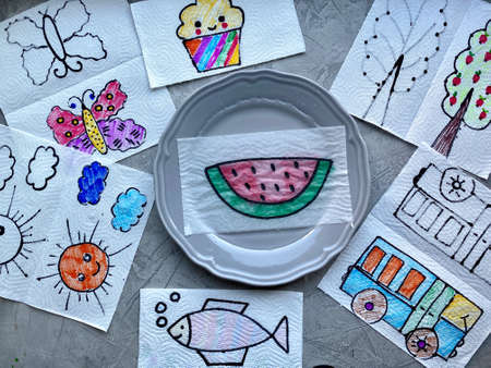 Magic in a plate of water, drawings of childrens shows will appear multicoloredの写真素材
