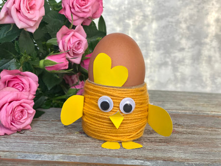 Yellow chicken Easter craft from recycling toilet paper.の写真素材