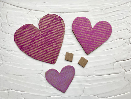 Heart of different sizes made of cardboard, childrens crafts for the holiday.の写真素材