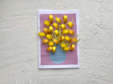 Childrens applique, spring flowers made of colored paper.の写真素材