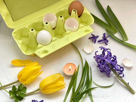 Easter decor for kids craft. Creativity from natural materials. Floristry of eggs and flowers.の写真素材