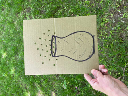 Childrens craft game on the street made of cardboard and flowers.の写真素材