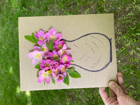 Childrens craft game on the street made of cardboard and flowers.の写真素材