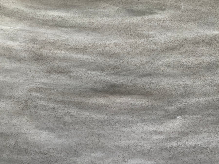 the dark gray textured background is painted on paper with watercolor paints.の写真素材