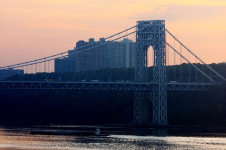 View from Washington bridge connecting New York and New Jersey at sunsetの写真素材