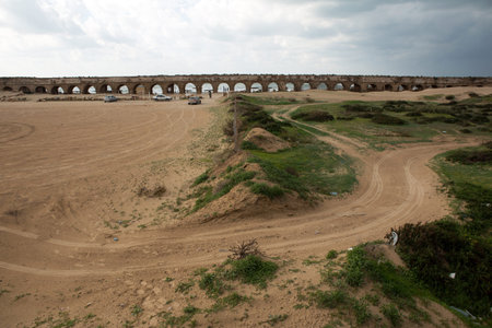 An old aqueduct in the city Ceasaria in Israelの写真素材