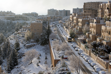 Jerusalem neighborhood and forest after a snow storm のeditorial素材