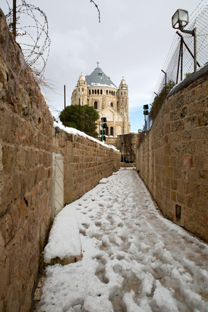 Old city churches in Jerusalem, at winter snowの写真素材