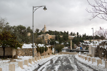 Old city churches in Jerusalem, at winter snowの写真素材