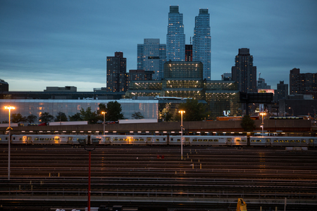 High Line park in Manhattan, New York with the city layers and a benchのeditorial素材