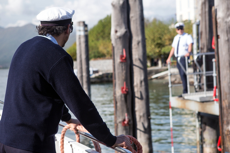 Boat worker on the Maggiore lake in Italyのeditorial素材