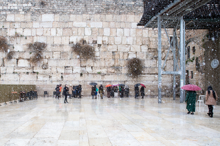 The Western Wall in Jerusalem, empty of people during snowのeditorial素材