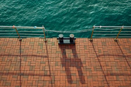 Bollards at the marina sunny day top view.の写真素材